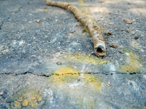 An image of a corroded PVC pipe