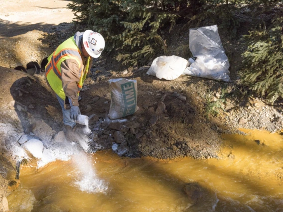 An image of an EPA worker in a water source