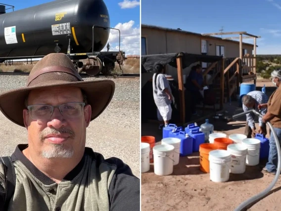 An image of a railroad worker delivering water to a community