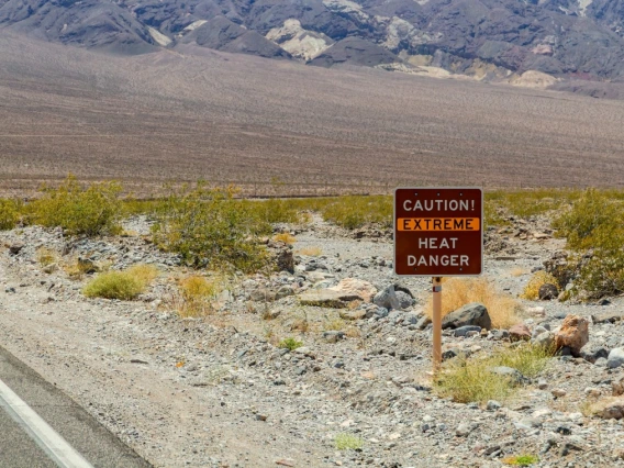 An image of an extreme heat sign in a desert