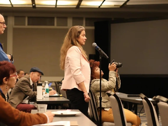 An image of Dr.Beamer speaking at a conference 