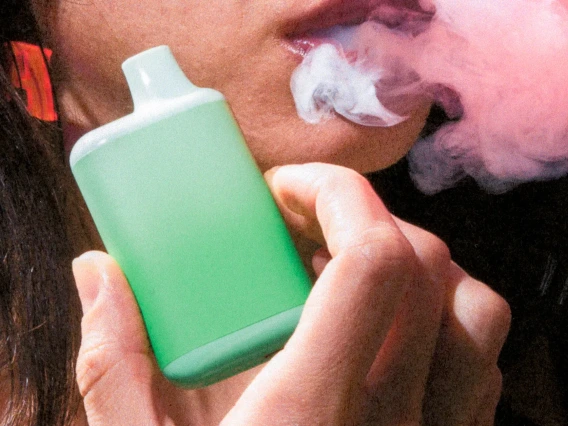 Image of a woman vaping