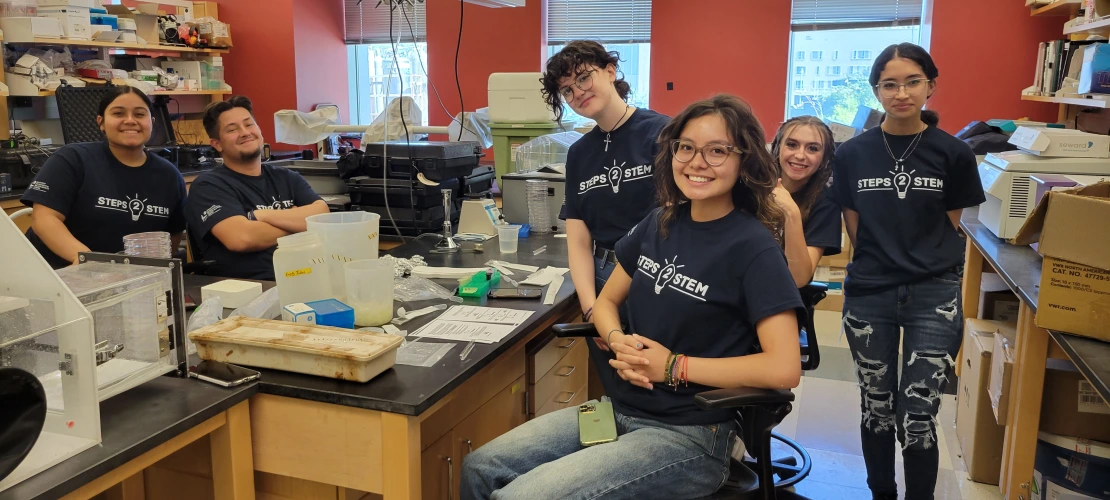 A picture of students in a lab. 
