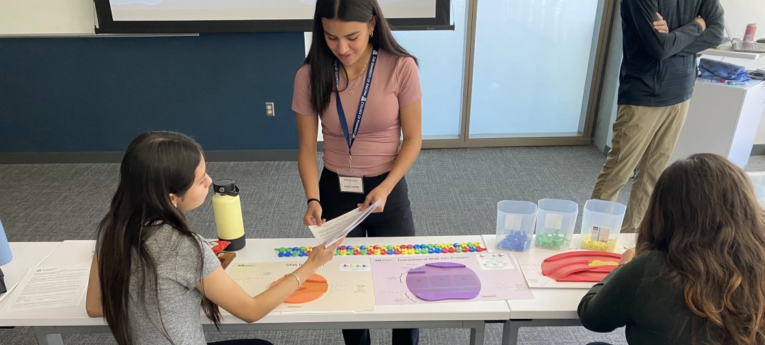 An image of STEM students participating in a DNA activity 