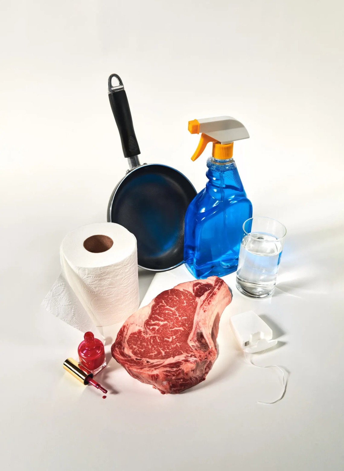 An image of a steak surrounded by various chemicals