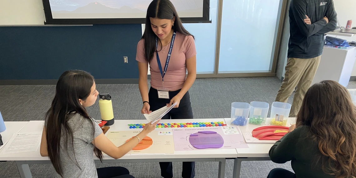 An image of STEM students participating in a DNA activity 