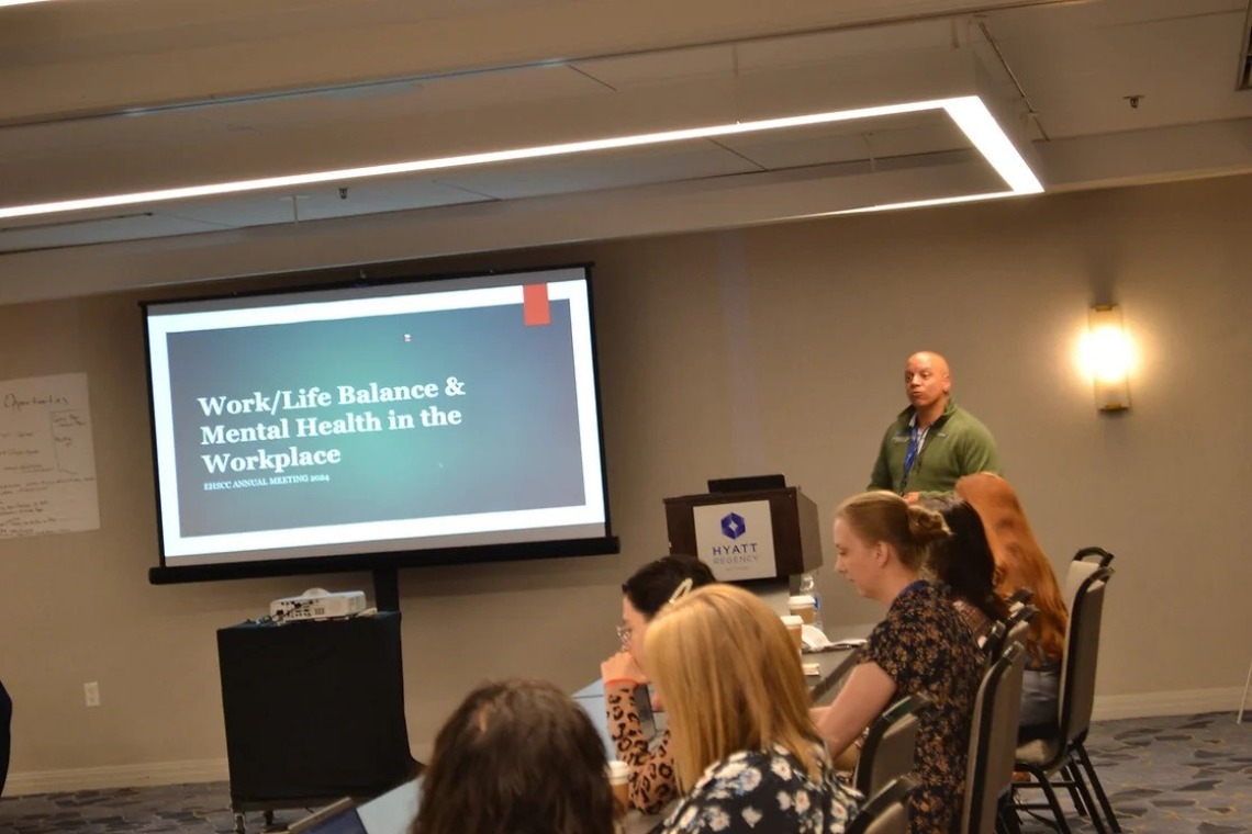 A picture of a group of researchers at a conference 