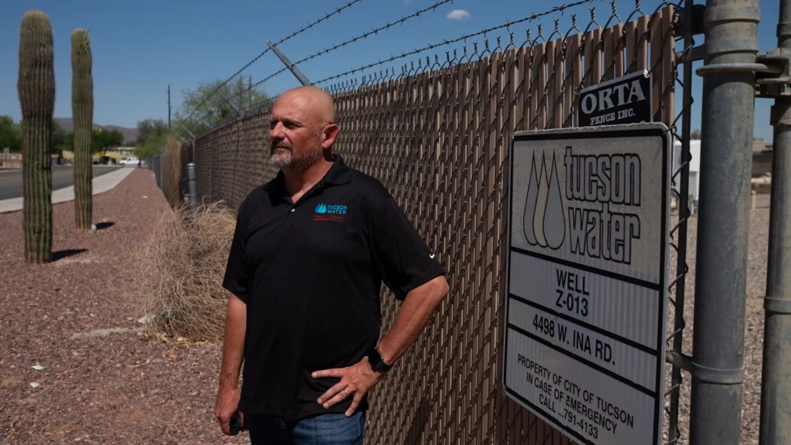 Tucson Water Director John Kmiec stands next to one of about 40 city wells that have been shut off because of PFAS contamination.