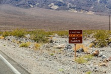 An image of an extreme heat sign in a desert