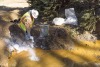 An image of an EPA worker in a water source
